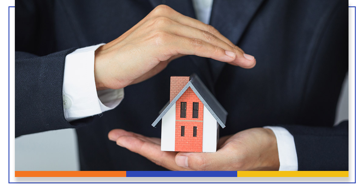 house model in hands of businessman