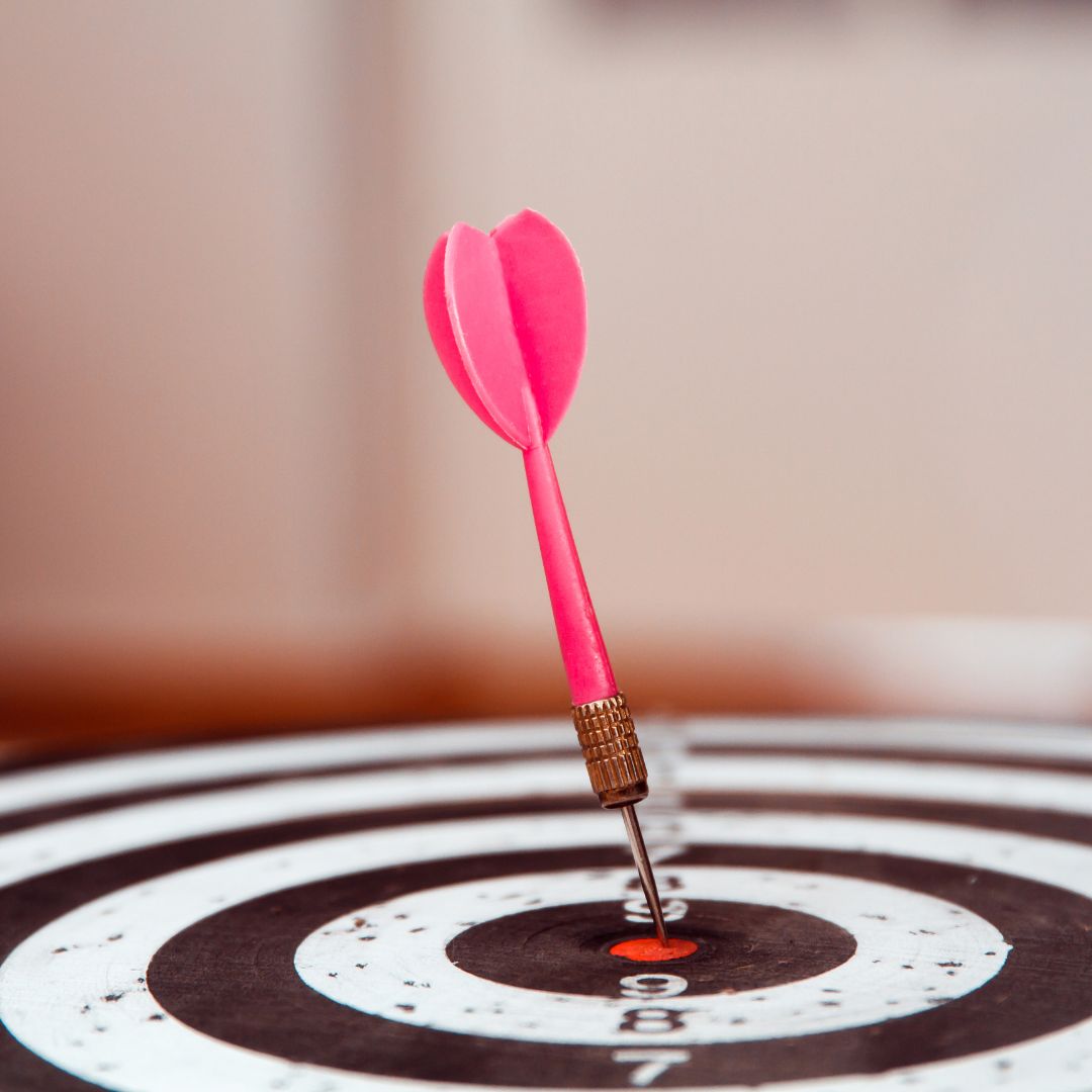 dart hitting bullseye