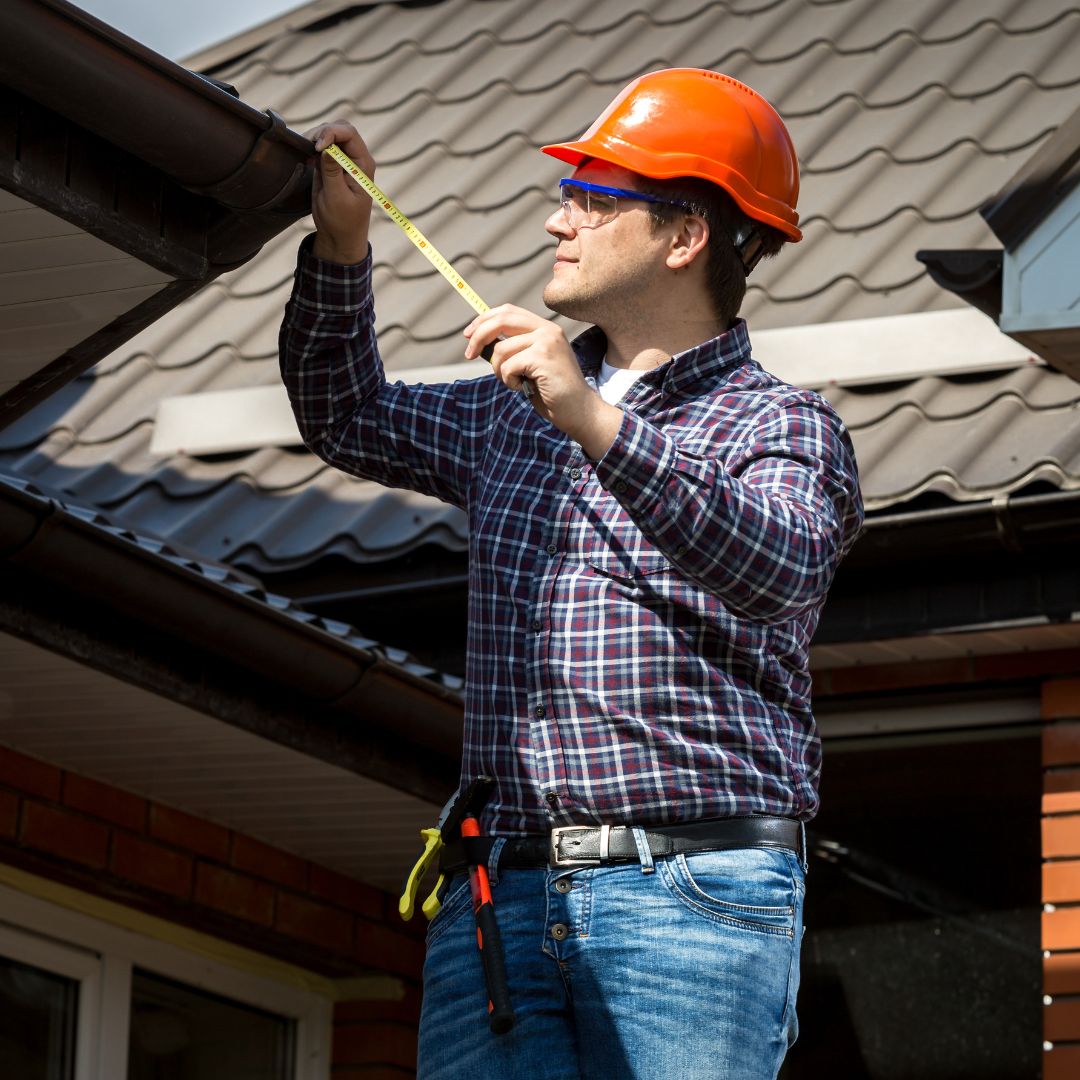 Inspector checking gutters