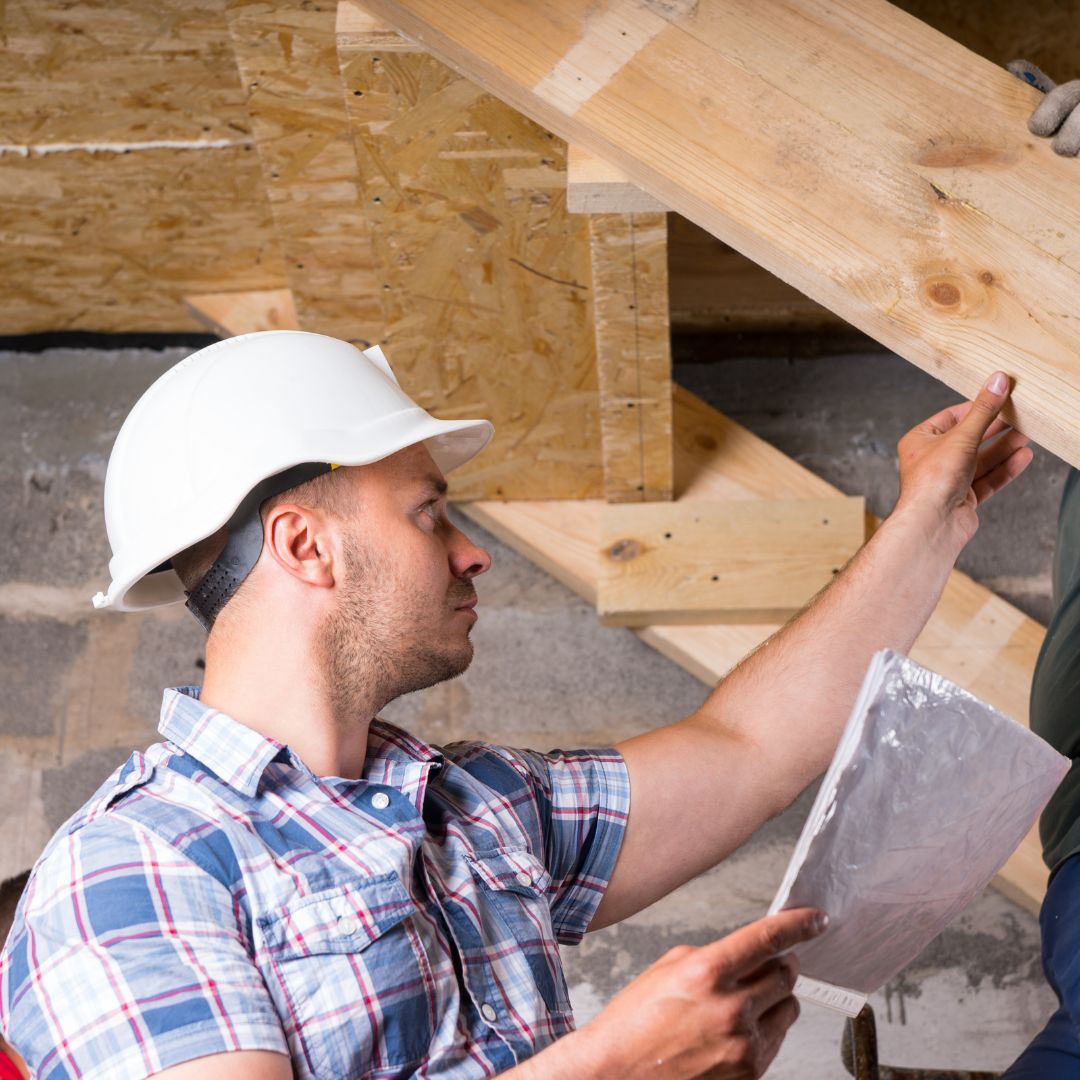 Inspector checking stair construction