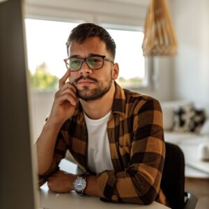 man taking online class