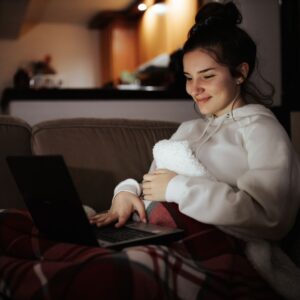 woman taking online course in the evening