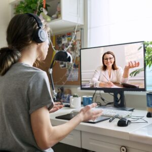 woman video chatting with instructor