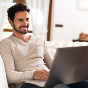 man taking online course from home