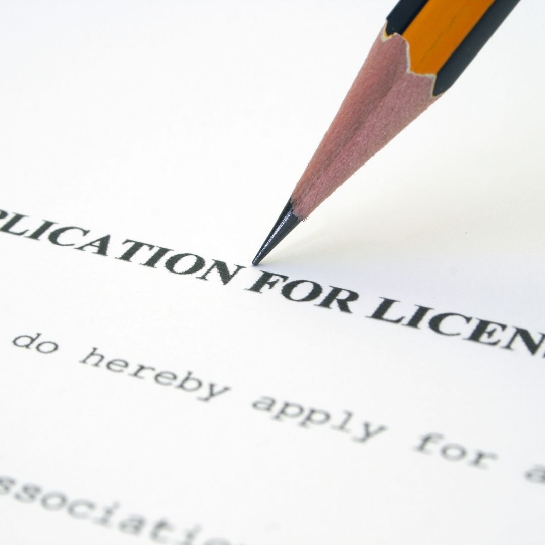 Pencil on paper that reads "Application for License"