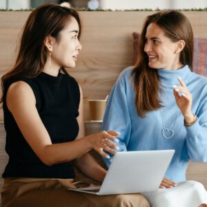Real estate salespeople talking.